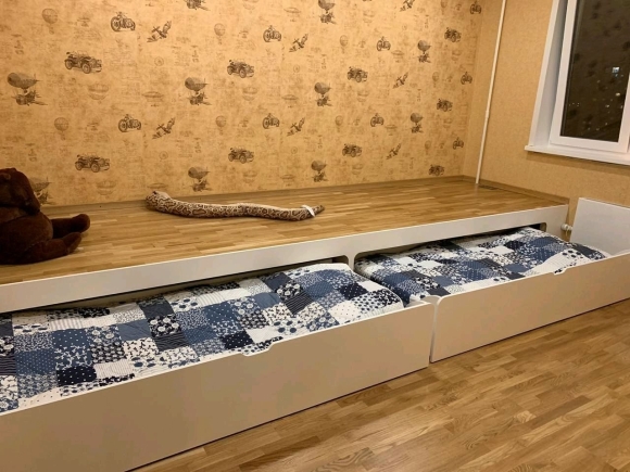 Выкатная кровать из подиума